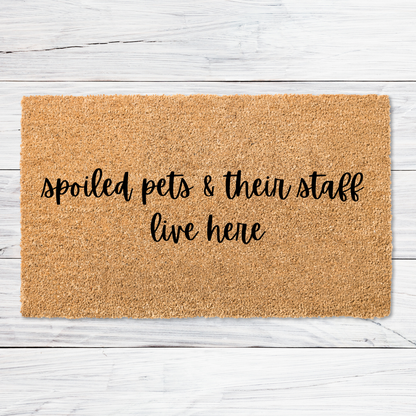 Spoiled pets and their staff doormat